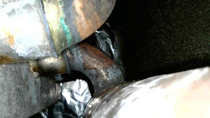 Performed tune-up service on 30+ year old Lennox Pulse furnace. Identified and replaced broken elbow connecting to exhaust where pressure switch attaches. Inspection revealed compromised heat exchanger with extensive corrosion and deterioration documented in photographs. Due to age of unit and limited parts availability, recommended complete system replacement. Scheduled sales consultant for replacement quote.