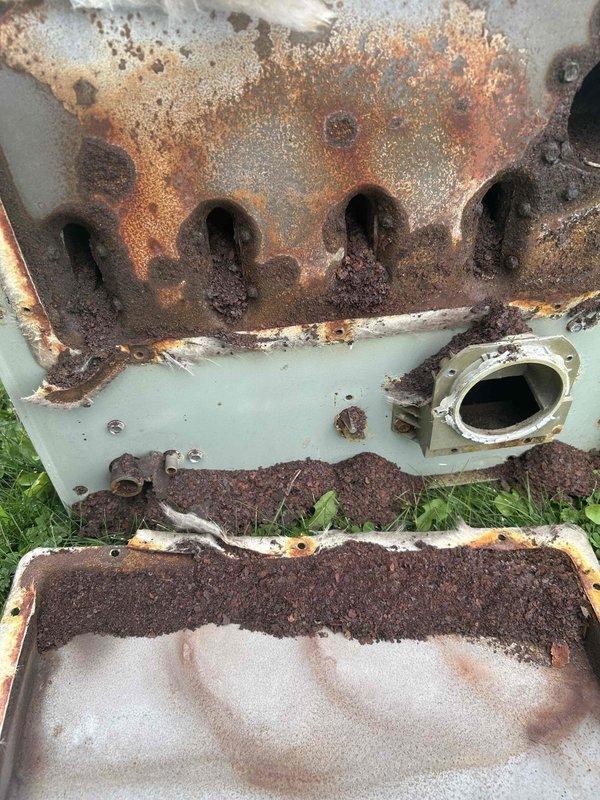 Successfully completed heat exchanger replacement on severely corroded furnace unit. Removed the deteriorated heat exchanger showing extensive rust damage and debris accumulation. Installed new heat exchanger, performed thorough testing, and verified proper operation of the furnace system.
