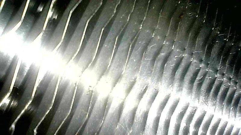 Performed scheduled maintenance tune-up on two Carrier furnaces (approximately 3 years old) while noting third furnace was not in service per customer's information. Conducted diagnostic testing using electronic measurement tools to verify system parameters and inspected heat exchanger components. Cleaned and evaluated coil surfaces to ensure proper heat transfer efficiency.