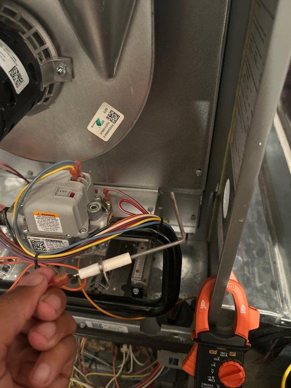 Performed routine maintenance on 11-year-old Ruud furnace. Cleaned flame sensor, verified proper ignitor operation, and confirmed good amp draws on inducer and blower motors. System is operating safely with appropriate gas pressures, clean filter, clear condensation drains, and sound electrical components.