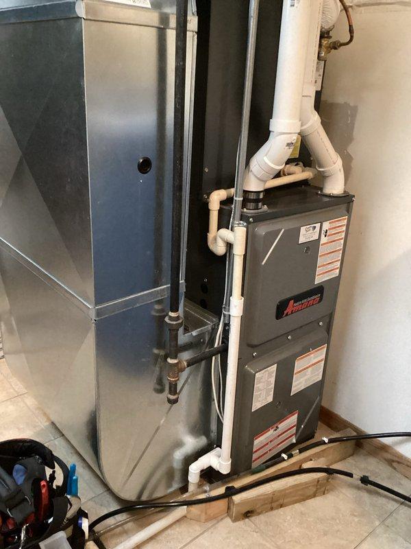 Performed scheduled Family Rewards furnace tune-up, including cleaning flame sensor, verifying proper condensate drainage, and inspecting heat exchanger. Cleaned burners, replaced air filter, and verified system operation with 50° temperature rise. Reconfigured wireless thermostat settings (setup #504) to address customer's concern about upstairs temperature regulation, instructing customer to monitor performance and contact if issue persists.