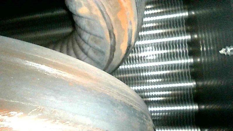 Performed scheduled Family Rewards furnace tune-up, including cleaning flame sensor, verifying proper condensate drainage, and inspecting heat exchanger. Cleaned burners, replaced air filter, and verified system operation with 50° temperature rise. Reconfigured wireless thermostat settings (setup #504) to address customer's concern about upstairs temperature regulation, instructing customer to monitor performance and contact if issue persists.