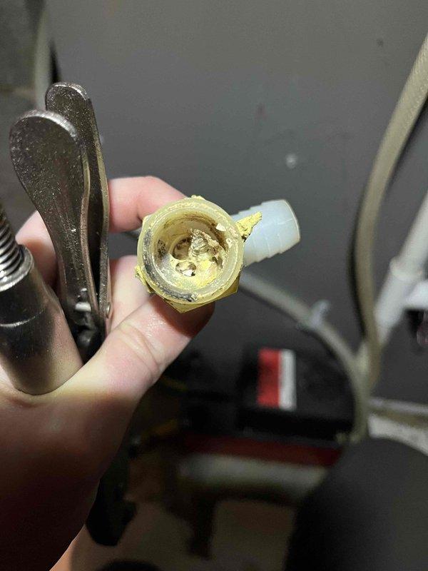 Performed annual furnace tune-up on Lennox unit. Found and cleared clogged elbow fitting in AC drain pan, resolving reported water leakage issue. Replaced UV bulb and filter (customer-provided), verified electrical components within specification, cleaned flame sensor, and cleared all drain hoses. Unit operating properly after service.