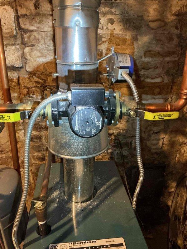 Responded to a service call regarding a leaking bleeder valve on a 15-year-old Burnham Series 2 boiler. Upon arrival, customer had already resolved the issue. Performed comprehensive inspection of the system including piping, system pressure, expansion tank, pressure relief valve, backflow preventer, venting, and combustion analysis. All components were found to be in good working condition with no CO leakage. System is operating safely and efficiently with no current issues requiring attention.