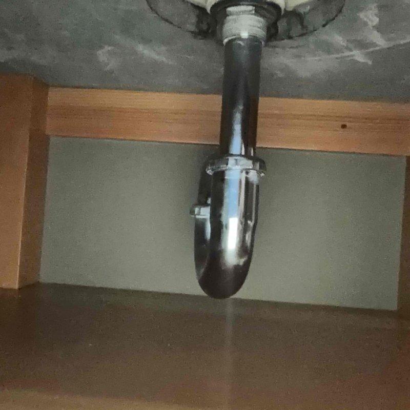 Responded to service request for a leaking sink repair. Upon inspection, determined the back nut on P-trap was loose though no active water was present. Disassembled the entire trap assembly, applied lubricant to all joints, and reassembled components securely to ensure proper seal and drainage function. Verified repair with no leaks observed post-service.