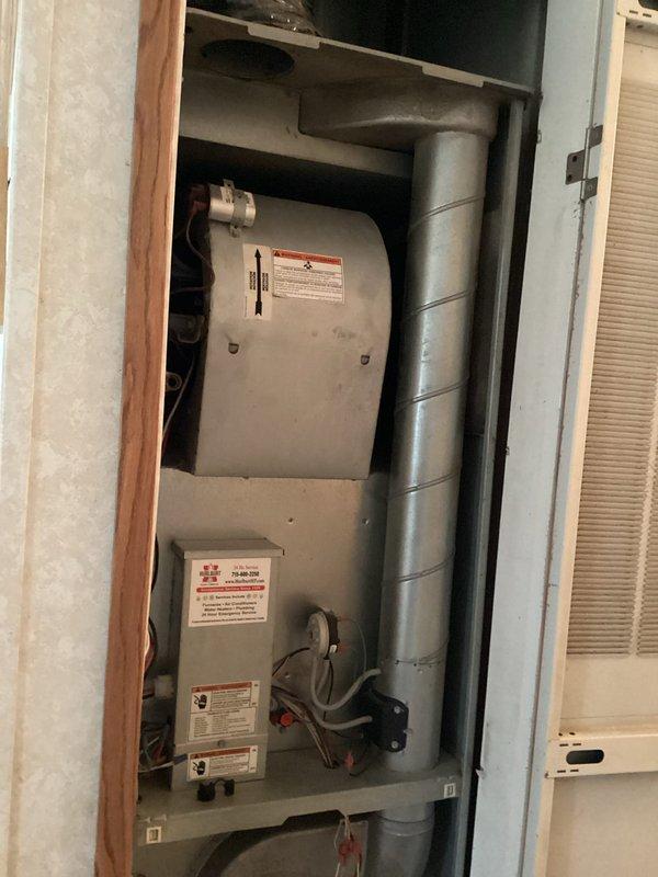 Performed comprehensive furnace tune-up on 9-year-old system. Inspection revealed dirty blower wheel with excessive play, capacitor reading below specifications (7.1uf vs 7.5uf required), and filters requiring replacement. System operated properly during 20-minute test with appropriate gas pressures and 60-degree temperature rise. Recommended blower wheel replacement and cleaning to customer, with office to provide formal estimate for motor replacement.