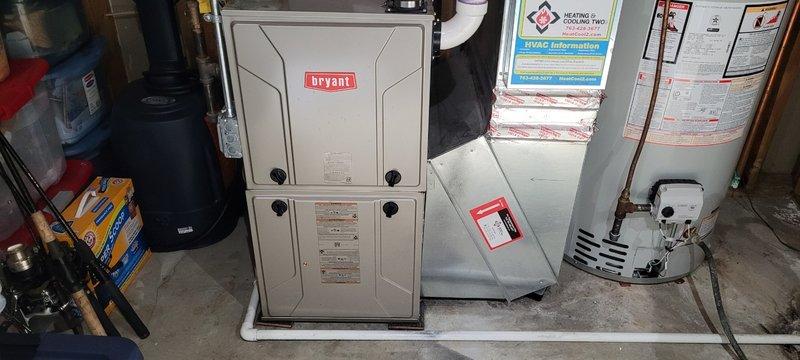 Diagnosed 6-year-old Bryant furnace with no heat issue, discovering a wiring problem causing simultaneous AC and furnace operation, along with a malfunctioning gas valve preventing proper gas flow. Informed customer about thermostat rewiring needs and gas valve replacement, noting the system should be covered under warranty.