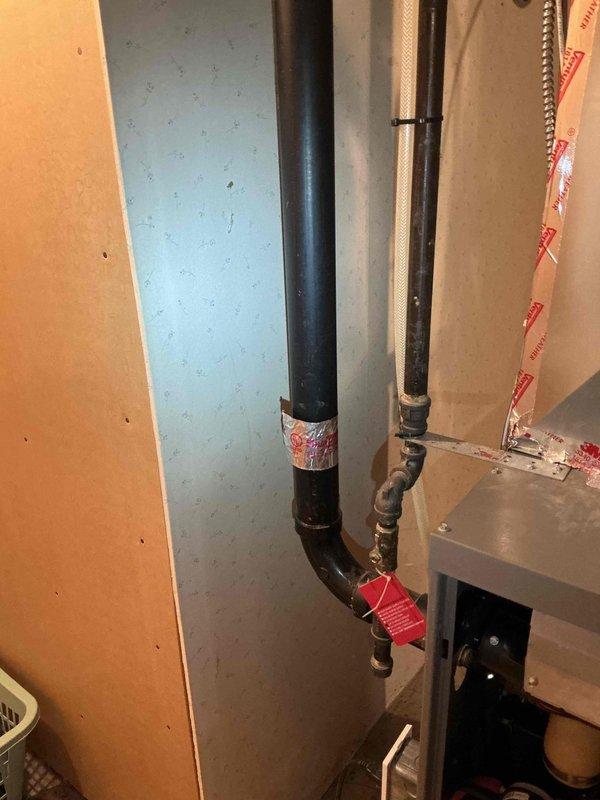 Diagnosed no heat issue on 18-year-old Lennox furnace. Found recently installed thermostat had failed, confirmed by successful operation when jumper wires were applied. Replaced thermostat but discovered failed flame sensor that could not be restored through cleaning. Identified grinding noise from draft motor indicating imminent failure. System unable to maintain operation for complete diagnostics. Recommended replacement options for aging furnace.