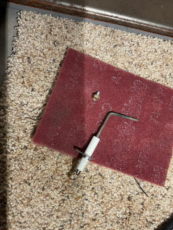 Responded to a no heat call for a 10-year-old furnace. Diagnosed a flame sensor reading out of specification and a gas valve receiving 27V but failing to open. Demonstrated the system malfunction to homeowner Tom using a contactor to visually confirm voltage supply to the gas valve. Completed a comprehensive tune-up of the furnace components and discussed replacement options with the customer.
