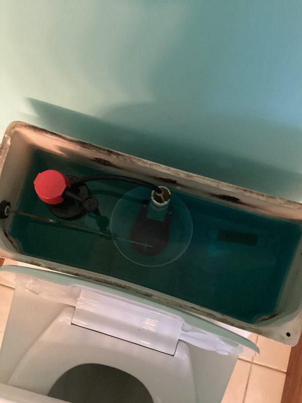 Replaced defective fill valve and flapper in toilet experiencing constant running issue. Water level now properly regulated and continuous water flow stopped. Flush system fully operational with no leaks observed.