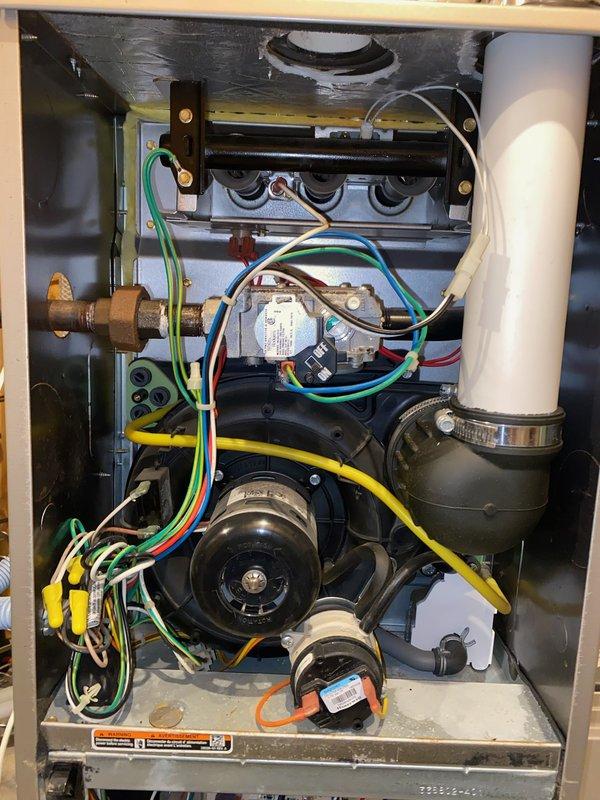 Responded to no heat complaint on 9-year-old furnace. Diagnosed gas valve stuck in closed position preventing proper ignition and heat production. Applied percussive maintenance to free the stuck valve, successfully restoring system operation. Visually inspected control board and blower assembly; all components now functioning properly.