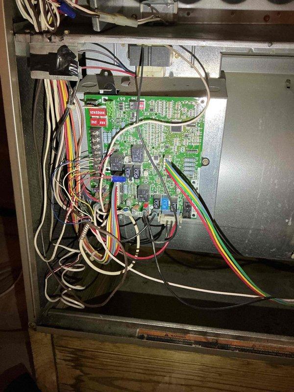 Responded to no heat call for a 9-year-old natural gas Bryant furnace. Diagnosed failed variable speed ECM motor that would not activate during fan-only or heating cycles. Confirmed motor failure through resistance testing and observed corresponding error code on control board. Identified additional wear on heat exchanger and age-related component deterioration throughout system. Reviewed replacement options with homeowner.