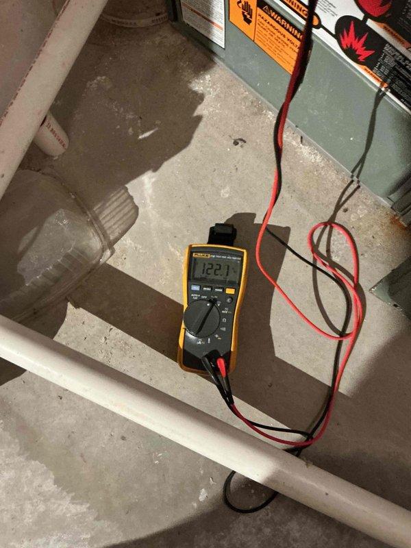 Responded to no heat call at customer's residence. Diagnostic testing revealed pressure switch failure and an inoperable draft inducer motor. Upon inspection, draft motor was receiving proper voltage (122.1V confirmed with multimeter) but failed to operate, producing humming noise and burning odor. System was shut down for safety. Customer declined further troubleshooting and opted to pursue furnace replacement options instead of motor repair.