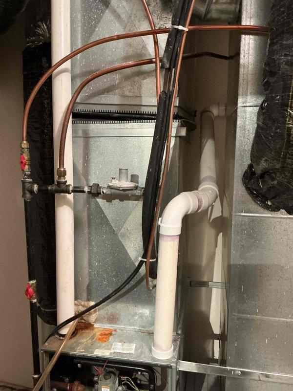 Responded to no heat call at customer's residence. Diagnostic testing revealed pressure switch failure and an inoperable draft inducer motor. Upon inspection, draft motor was receiving proper voltage (122.1V confirmed with multimeter) but failed to operate, producing humming noise and burning odor. System was shut down for safety. Customer declined further troubleshooting and opted to pursue furnace replacement options instead of motor repair.