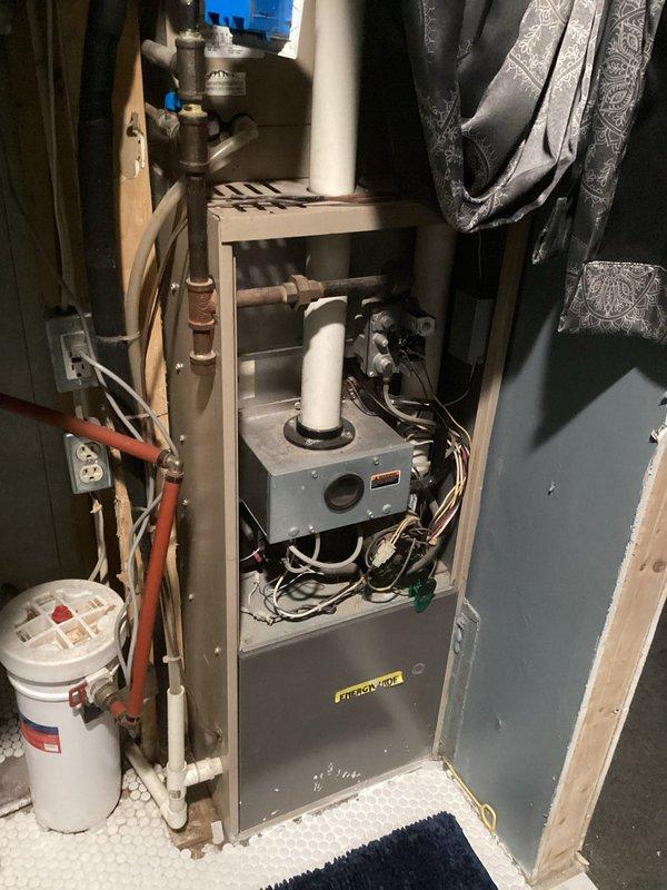 Responded to a no heat complaint on a 10+ year old system. Diagnosed and replaced failed blower motor capacitor to restore heat functionality. Identified secondary issues including a plugged secondary heat exchanger and dirty fan wheel that require attention; advised customer of these conditions and provided repair options.