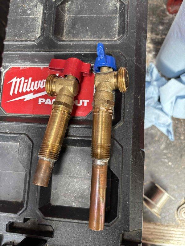 Responded to service call for no water to home. Diagnosed broken washer valve causing leak. Replaced both hot and cold shut-off valves with new brass fixtures to restore proper water flow to residence.