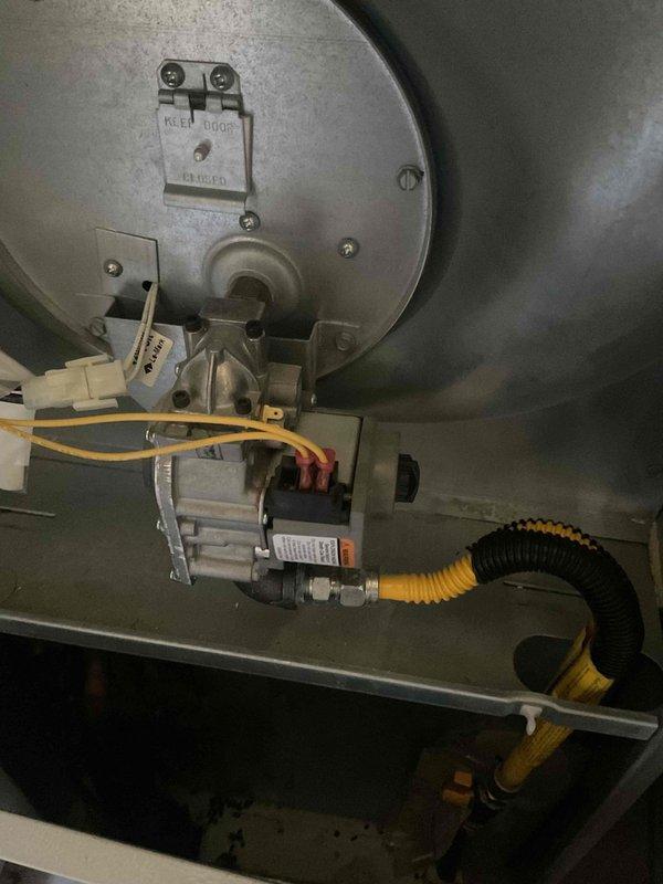 Responded to no-heat call for aging system (10+ years). Diagnosed multiple issues: failed igniter, noisy inducer motor, and non-functional gas valve. Replaced defective gas valve, restoring proper heating function to the system.