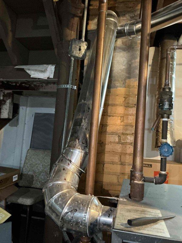 Responded to no-heat call for 30+ year old boiler system. Diagnostic testing confirmed failed gas valve preventing pilot light operation, verified by checking other functioning gas appliances. Determined mercury-based gas valve/thermocouple component is obsolete and unrepairable. Scheduled follow-up with service advisor for boiler replacement consultation.
