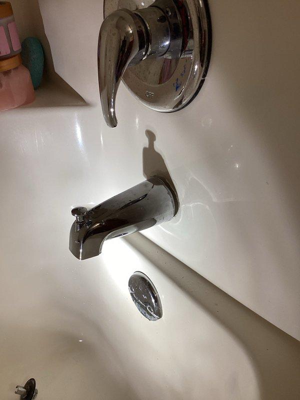 Responded to service call for detached shower faucet and non-functioning diverter. Diagnosed and replaced leaking tub spout with new brass component. Confirmed proper operation of all bathroom plumbing fixtures upon completion.
