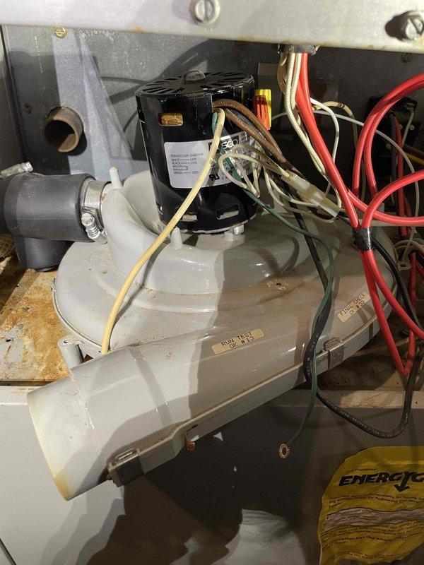 Diagnosed 33-year-old furnace with no heat issue despite functioning fan. Inspection revealed failed inducer motor and deteriorated black boot connection to collector box, both showing significant age-related wear and corrosion. Due to obsolete components and overall condition, recommended system replacement; scheduled consultation with advisor for replacement options. Diagnosed 33-year-old furnace with no heat issue despite functioning fan. Inspection revealed failed inducer motor and deteriorated black boot connection to collector box, both showing significant age-related wear and corrosion. Due to obsolete components and overall condition, recommended system replacement; scheduled consultation with advisor for replacement options.