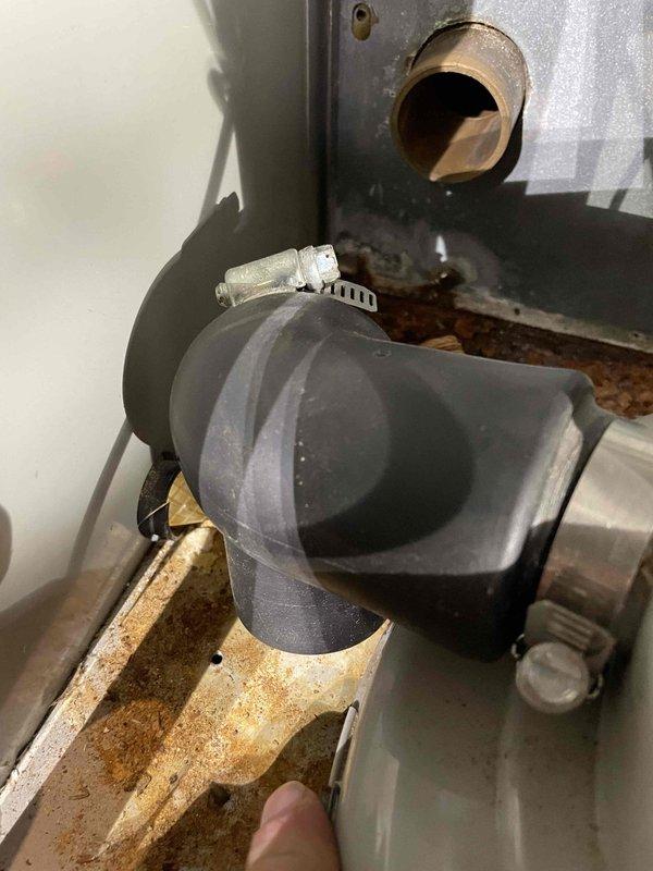 Diagnosed 33-year-old furnace with no heat issue despite functioning fan. Inspection revealed failed inducer motor and deteriorated black boot connection to collector box, both showing significant age-related wear and corrosion. Due to obsolete components and overall condition, recommended system replacement; scheduled consultation with advisor for replacement options. Diagnosed 33-year-old furnace with no heat issue despite functioning fan. Inspection revealed failed inducer motor and deteriorated black boot connection to collector box, both showing significant age-related wear and corrosion. Due to obsolete components and overall condition, recommended system replacement; scheduled consultation with advisor for replacement options.