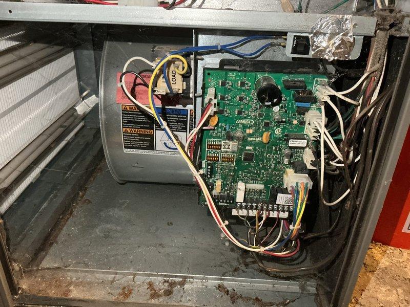 Responded to no-heat call for 15-year-old furnace experiencing cold air output. Performed diagnostic inspection revealing plugged burners and heat exchanger. Successfully completed burner replacement and cleaned heat exchanger, returning system to proper operation with normal blue flame pattern confirmed during post-service verification.