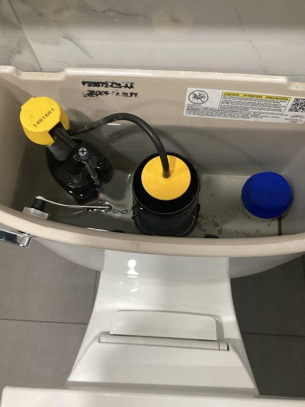Responded to service call for handicap toilet in men's restroom that was overflowing. Diagnostic inspection revealed broken flush valve component. Shut off water supply, disassembled tank, and replaced defective flush valve part. Tested toilet operation after repair to confirm proper function with no further leaking or overflow issues.