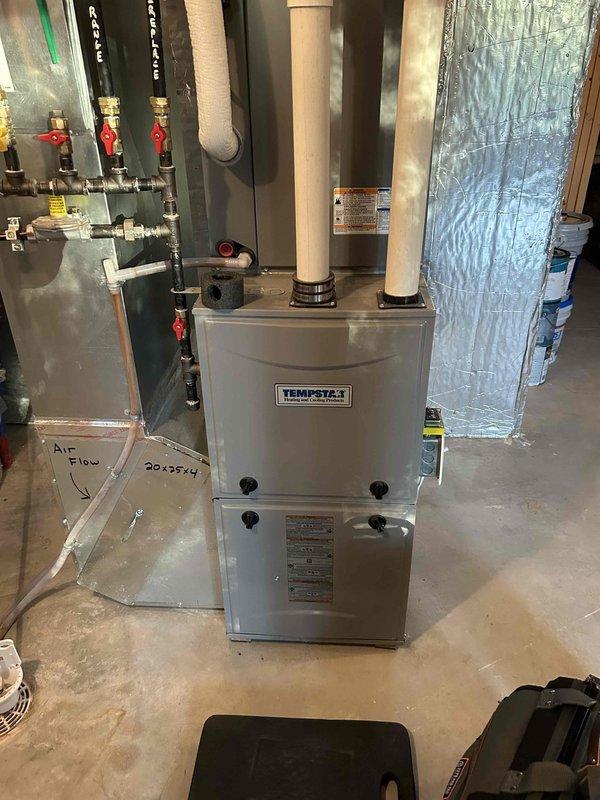 Performed routine furnace maintenance on 9-10 year old Tempstar unit. Found significant rust and debris buildup in condensation trap and drain line; cleared blockage to restore proper drainage. Conducted combustion analysis, checked/adjusted gas pressures to manufacturer specifications, and verified carbon monoxide levels within safe parameters.