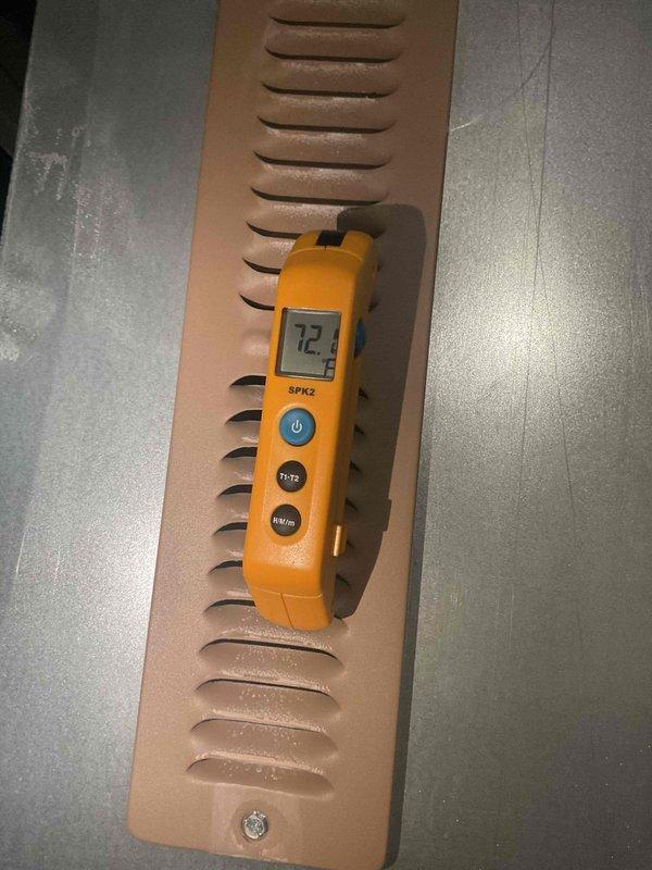 Conducted diagnostic inspection of furnace system in response to customer concerns. Verified ambient temperature readings using SPK2 meter at supply register (72.3°F) and performed visual inspection of interior components including blower motor and control board wiring. No operational issues were identified during testing, confirming previous service provider's assessment.