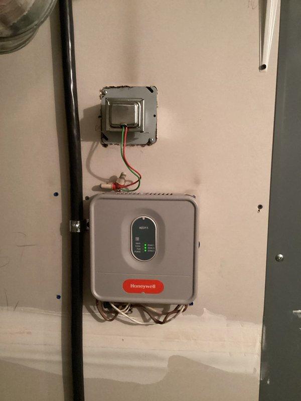 Performed annual furnace tune-up for Family Rewards member, including comprehensive inspection of heat exchanger (via camera), venting system, and exhaust flue. Checked all critical components including burners, blower, inducer, pressure switch, safety/limit switches, flame sensor, igniter, and gas pressures. System cycling confirmed proper operation with all components functioning normally. Documented existing Honeywell zone controller and properly insulated ductwork with all connections secure.