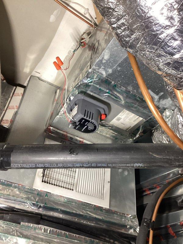 Performed annual furnace tune-up for Family Rewards member, including comprehensive inspection of heat exchanger (via camera), venting system, and exhaust flue. Checked all critical components including burners, blower, inducer, pressure switch, safety/limit switches, flame sensor, igniter, and gas pressures. System cycling confirmed proper operation with all components functioning normally. Documented existing Honeywell zone controller and properly insulated ductwork with all connections secure.