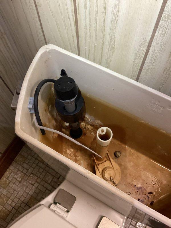 Diagnosed non-functioning basement toilet and found significant deterioration requiring complete replacement rather than repair. Installed new toilet unit after customer approval. Identified additional plumbing issues including a leaking main water shut-off valve and excessive water pressure (83 psi) requiring future installation of a pressure reducing valve.