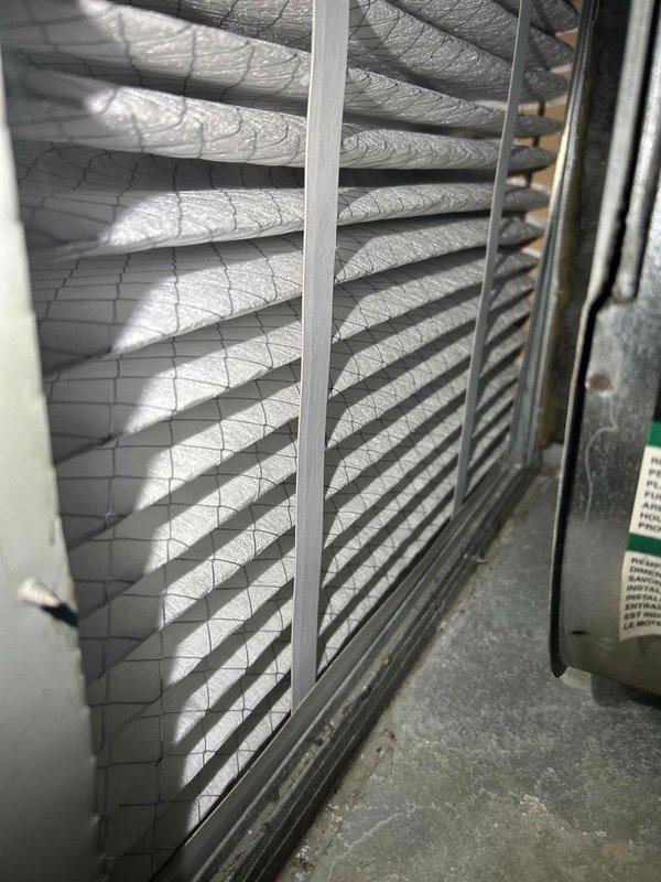 Responded to no-heat service call for 2008 American Standard furnace. Diagnosed a crack on the right top burner extending past the crimp, confirmed via visual inspection with homeowner. Tagged unit as unsafe to operate and recommended immediate repairs. Noted the outdoor AC unit (American Standard, 1992) is also at end of life; customer expressed interest in full system replacement.