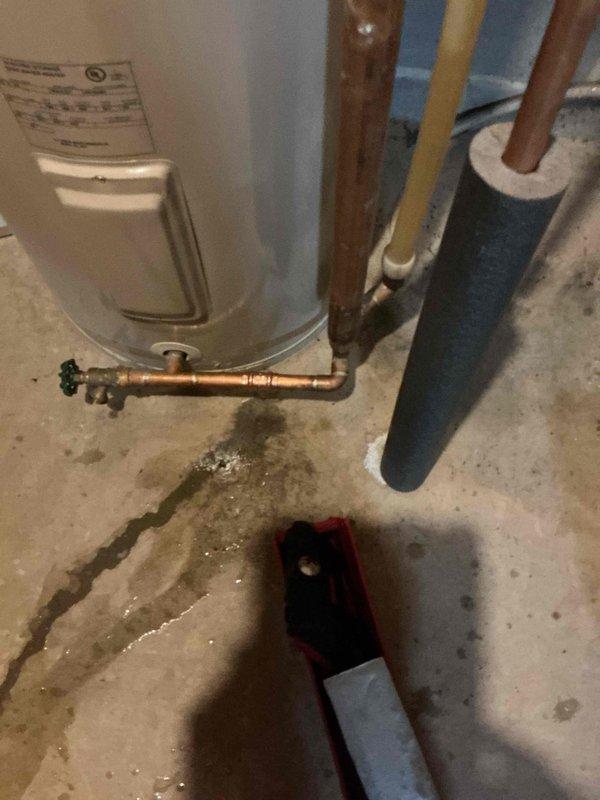 Installed new 50-gallon electric water heater to replace existing unit that was previously heated via central boiler. Temporarily stopped leak to allow time for proper installation. Completed conversion from boiler-heated system to standalone electric water heater with all necessary plumbing connections. Installed new 50-gallon electric water heater to replace existing unit that was previously heated via central boiler. Temporarily stopped leak to allow time for proper installation. Completed conversion from boiler-heated system to standalone electric water heater with all necessary plumbing connections.