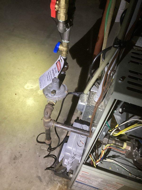 Responded to no heat call for 10+ year old HVAC system. Diagnosed failed control board and performed heat exchanger inspection, which revealed significant cracking above the limit hole - typical Trane failure pattern. System running but producing insufficient heat. Scheduled service advisor to provide replacement options for both furnace and AC components.