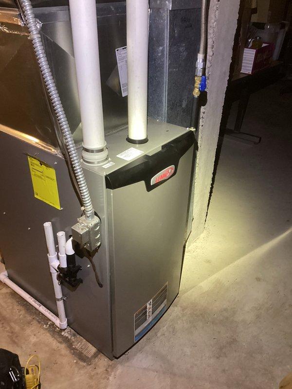 Responded to no-heat call for furnace. Observed system attempting normal ignition sequence but failing to light. Detected gas odor in home. Inspection of LP tank revealed it was completely empty. Notified homeowner that LP delivery is required for system to operate. Furnace appears to be in normal working condition and should function properly once fuel is supplied.