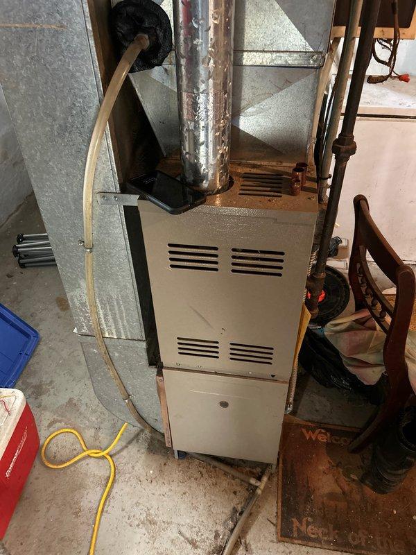 Performed comprehensive furnace tune-up on 20-year-old system. Inspected heat exchanger via camera, checked burners, blower, inducer, pressure switches, safety components, and exhaust flue. Identified weak ignitor and noted absence of dedicated gas shut-off valve. System currently operating normally; recommended installation of proper gas shut-off valve.