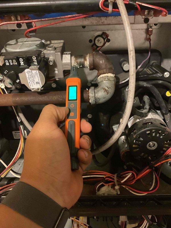 Performed standard furnace tune-up and diagnosed system with minor issues. Observed rust formation on heat exchanger and replaced dirty air filter. Customer advised to monitor system condition and ensure functioning CO detectors are in place due to potential heat exchanger deterioration.