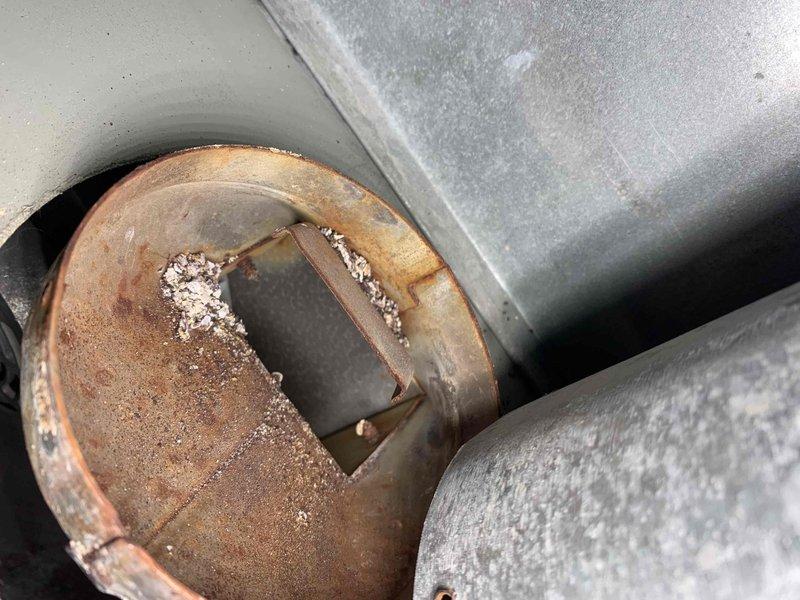 Performed comprehensive furnace tune-up and cleaning on 20-year-old system to address customer's complaint of moldy/musty odors during operation. Inspection revealed significantly rusted burners showing wear and a pitted flame sensor requiring replacement. System was thoroughly evaluated including heat exchanger camera inspection, venting, exhaust flue, and all safety components; unit is currently functioning within normal operating parameters despite age-related wear.