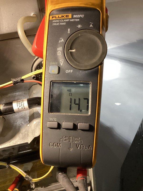 Performed comprehensive furnace tune-up and cleaning on 20-year-old system to address customer's complaint of moldy/musty odors during operation. Inspection revealed significantly rusted burners showing wear and a pitted flame sensor requiring replacement. System was thoroughly evaluated including heat exchanger camera inspection, venting, exhaust flue, and all safety components; unit is currently functioning within normal operating parameters despite age-related wear.
