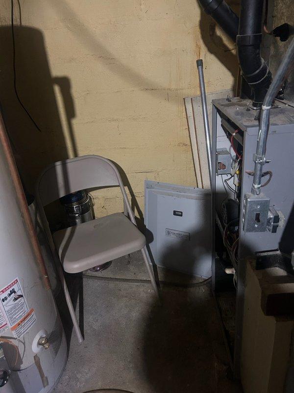 Responded to no-heat service call for 20-year-old natural gas furnace. Diagnosed failed ECM blower motor after verifying proper operation of flame sensor, ignitor, pressure switches, safety switches, and inducer motor. Successfully cycled system to confirm burners light but blower remains inoperative. Ordered replacement part and scheduled return service with Comfort Advisor.