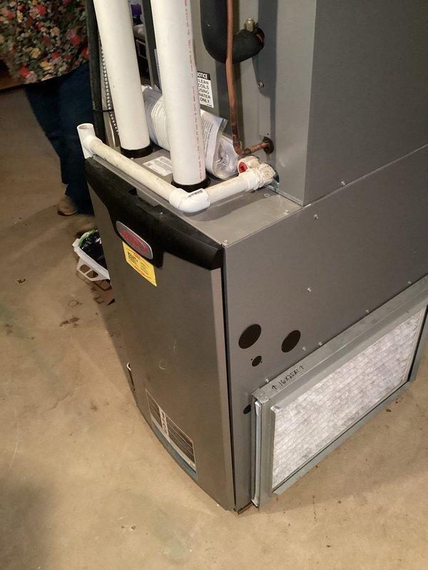 Performed annual maintenance on 8-year-old furnace and 14-year-old boiler under Family Rewards agreement. For furnace: cleaned flame sensor, verified proper condensate drainage, inspected heat exchanger and burners, checked filter and blower wheel. For boiler: cleaned igniter and flame sensor, confirmed proper system pressure and temperature settings. Both units tested operational with 50° temporize on furnace.