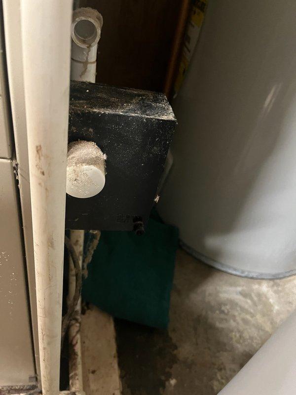 Responded to customer complaint of furnace leaking water from condensation trap. Inspected 21-year-old Lennox furnace and discovered missing clean out drain plug that was likely lost during recent tune-up service. Fabricated and installed replacement plug which successfully resolved the leak issue.