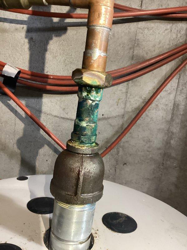 Responded to geothermal heating system failure. Diagnosed incorrect temperature settings on wrinkle control heat tank and system overpressurization. Corrected temperature settings, monitored system heat-up cycle and verified proper operation. Observed significant corrosion and mineral deposits on copper pipe assembly with evidence of moisture exposure and potential leakage at connection points. Responded to geothermal heating system failure. Diagnosed incorrect temperature settings on wrinkle control heat tank and system overpressurization. Corrected temperature settings, monitored system heat-up cycle and verified proper operation. Observed significant corrosion and mineral deposits on copper pipe assembly with evidence of moisture exposure and potential leakage at connection points.