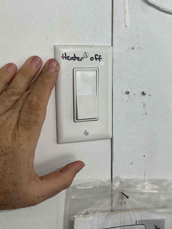 Responded to no heat complaint for garage heater (Mr. Heater MAXX unit). Discovered service switch labeled "Heater off" was in off position. Restored power and verified system operation. Visual inspection via scope revealed significant rust development in heat exchanger. Unable to perform comprehensive inspection due to unit's elevated mounting position and ladder height limitations. All other components functioning normally. Discussed replacement options with homeowner.