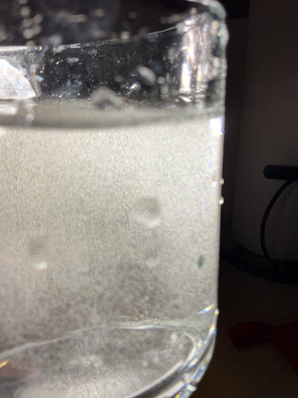 Inspected customer's water treatment system installed less than 12 months ago that was producing cloudy water with visible particulates. Verified filter cartridges require replacement due to sediment buildup. Identified faulty check valve on discharge line and ordered replacement component to prevent backflow issues and improve system performance.