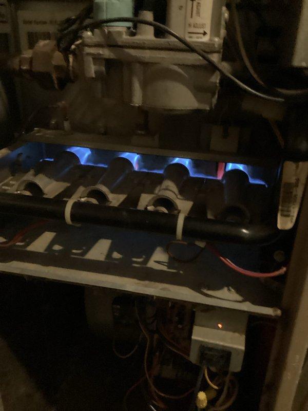 Responded to customer complaint of blower running constantly in an older HVAC system. Diagnosed the issue as a loose wire connection and repaired it. Conducted system verification by cycling through heating and cooling modes with the thermostat, confirming the system now operates properly with fan responding correctly to auto setting.