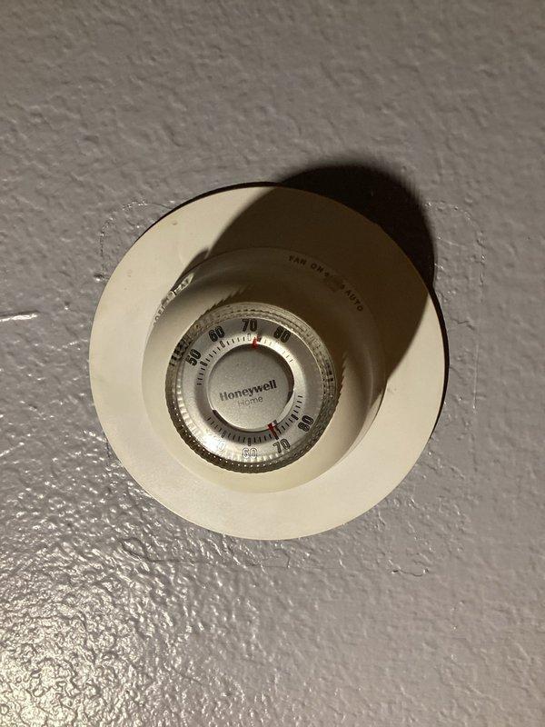 Responded to customer complaint of blower running constantly in an older HVAC system. Diagnosed the issue as a loose wire connection and repaired it. Conducted system verification by cycling through heating and cooling modes with the thermostat, confirming the system now operates properly with fan responding correctly to auto setting.