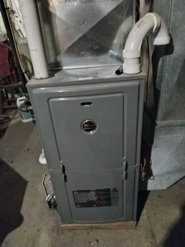 Diagnosed and resolved no heat issue in a Ruud furnace system by replacing a faulty thermostat. Performed thorough inspection of heat exchanger which showed good condition. System was test run to confirm proper operation of heating functions before completing service.