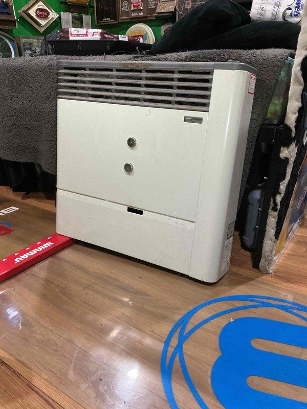 Responded to service call for direct vent garage heater in basement exhibiting intermittent heating issue. Diagnostic testing revealed pilot light ignites properly but main flame only sustains for approximately 30 seconds before extinguishing. Verified ventilation system is clear of obstructions. Unit appears to lack accessible flame sensor component. Determined specialized service required beyond standard repair capabilities due to equipment type.